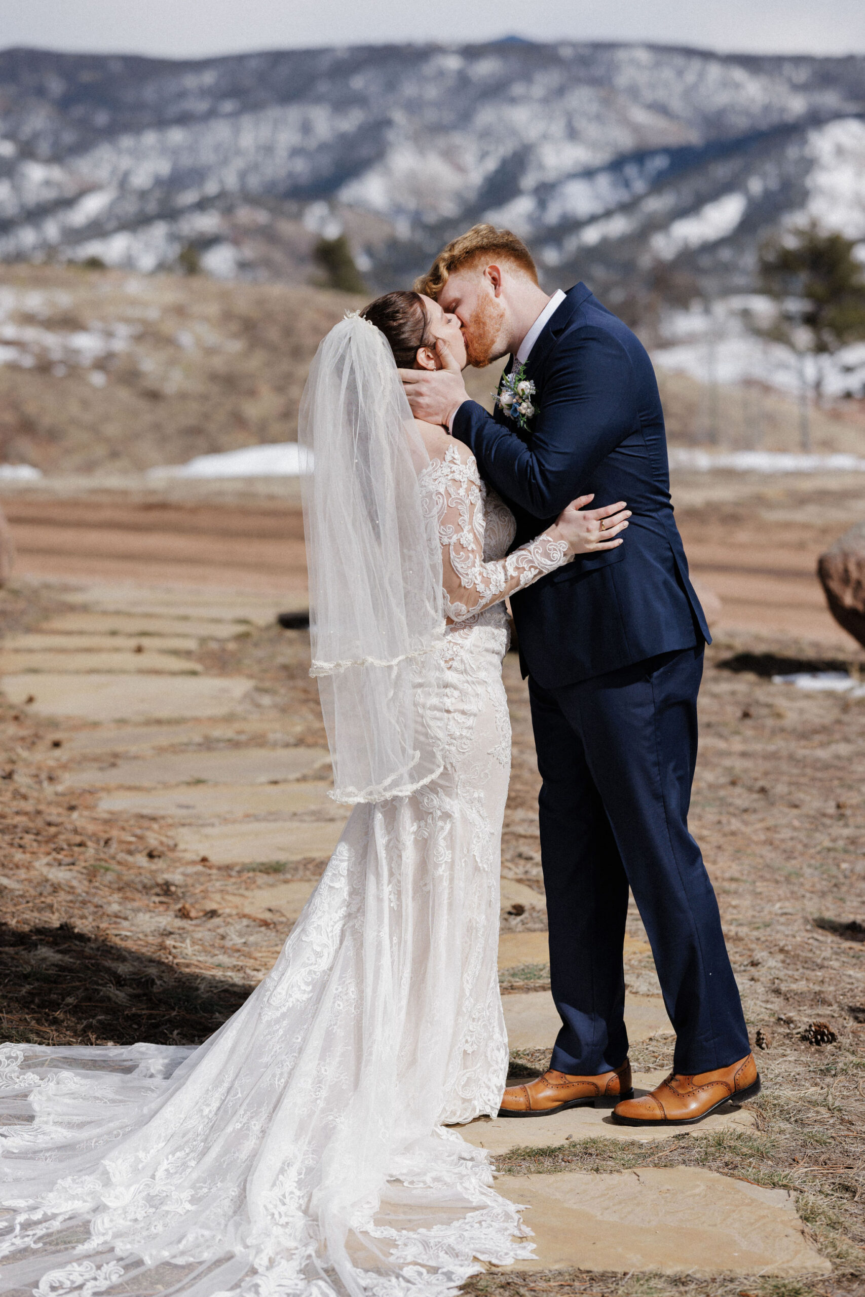 bride and groom kiss during colorado micro wedding in the mountains