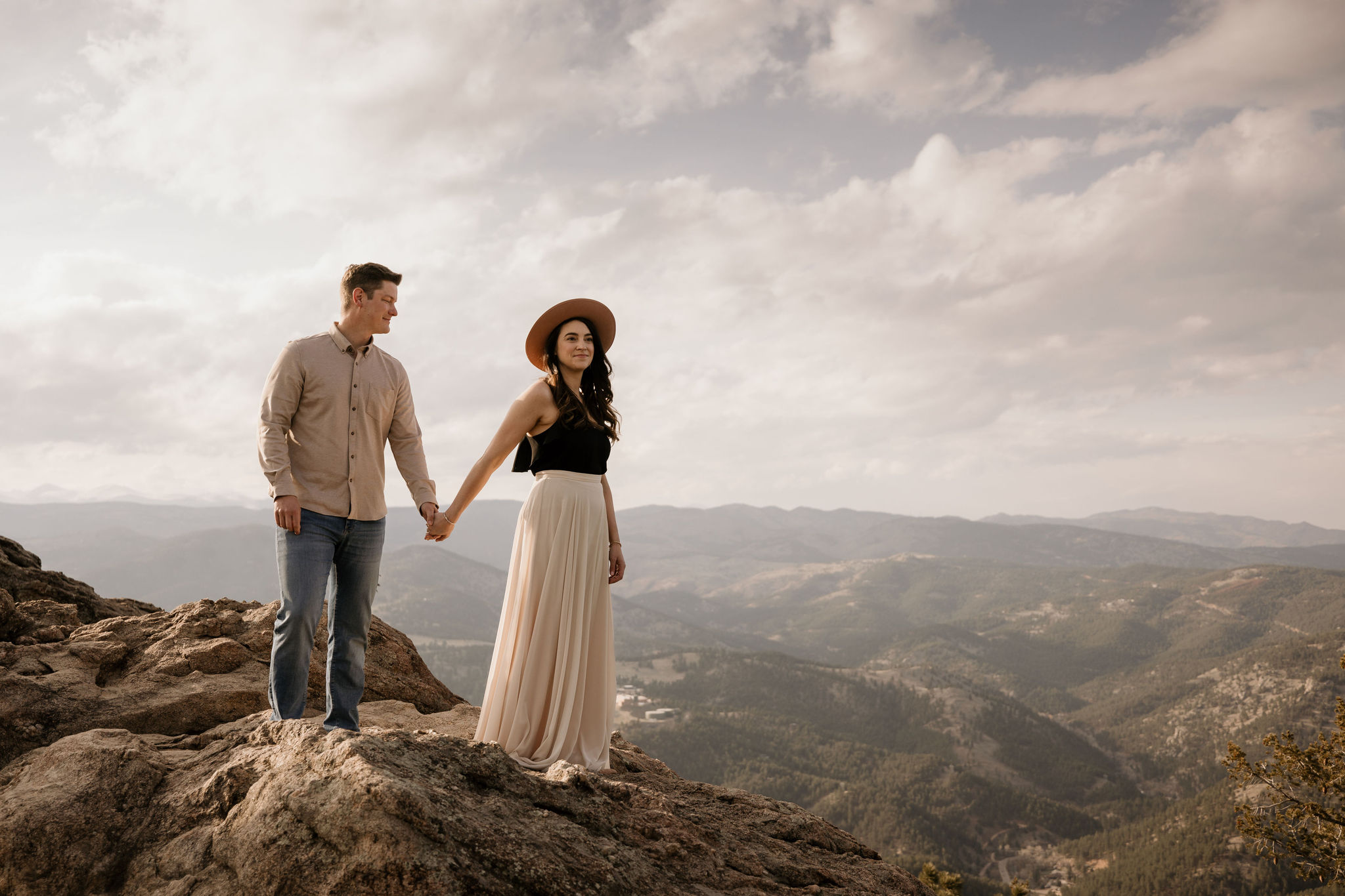 engaged couple wears neutral colors during colorado photo shoot