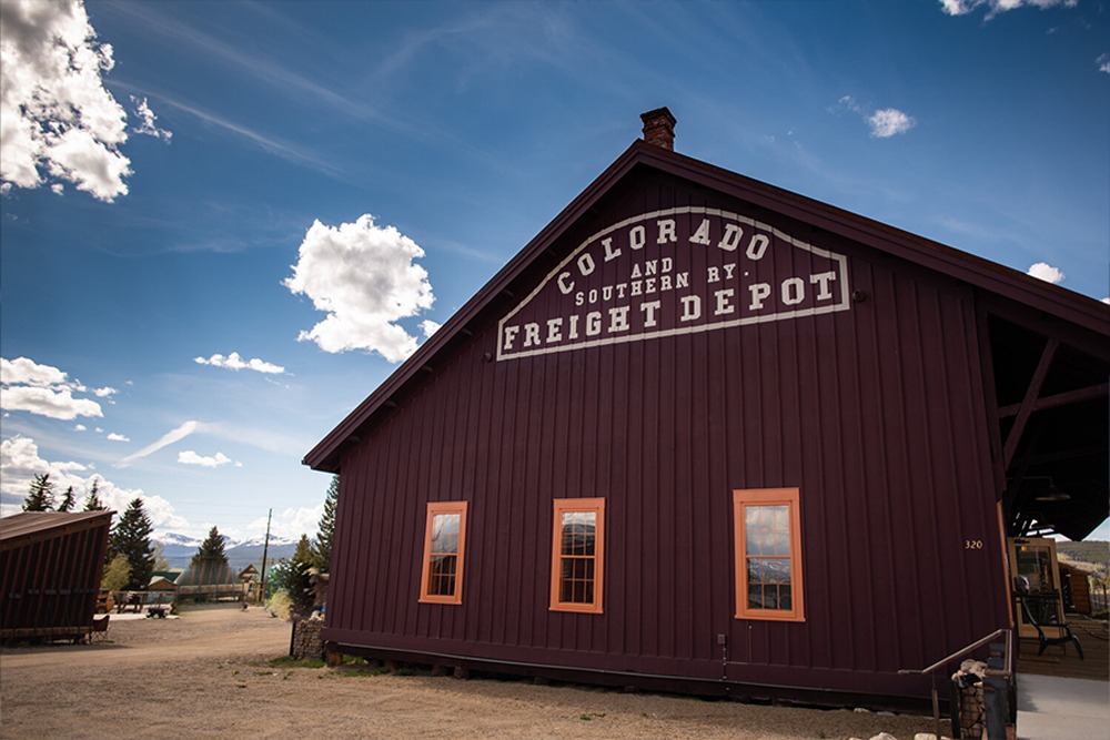 old train depot set up as a colorado micro wedding venue with guest lodging