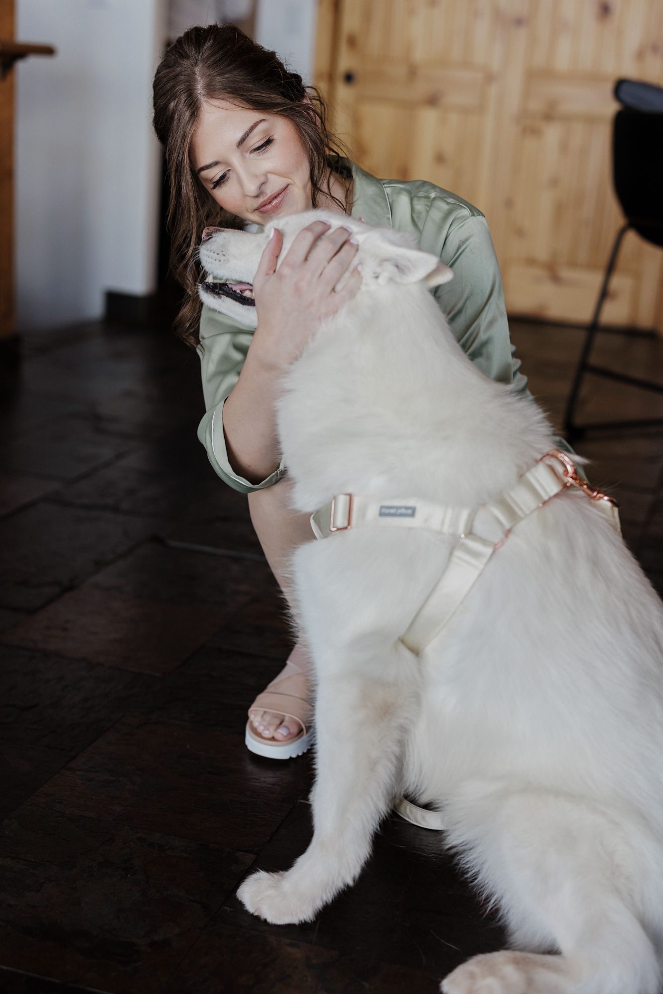 bride hugs her dog during colorado elopement