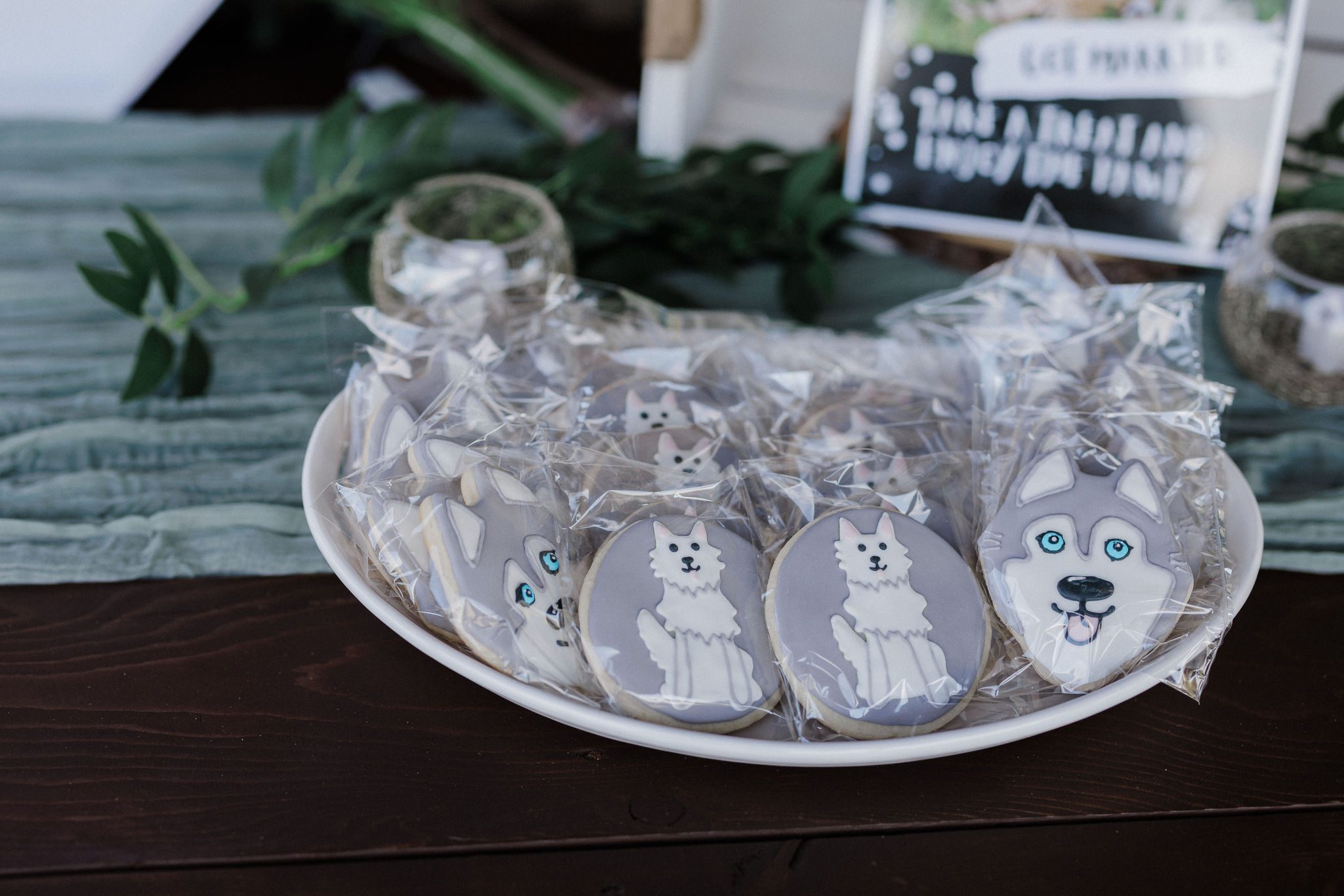 cookies with pup's faces sit on a table during colorado elopement with dog