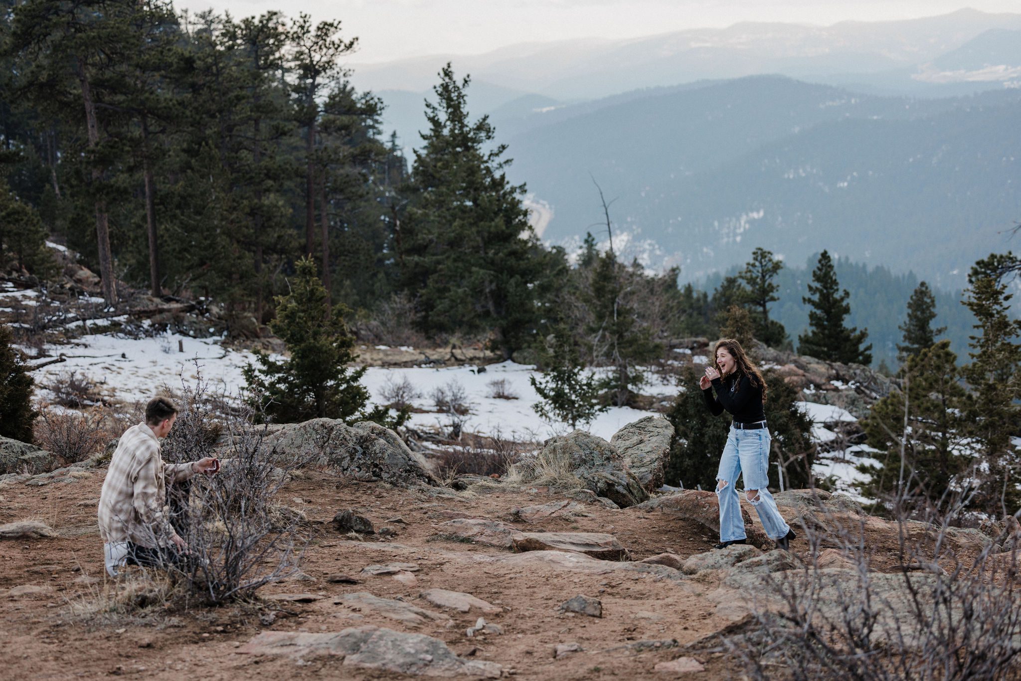 after choosing best place to propose in colorado, man asks woman to marry him in the mountains