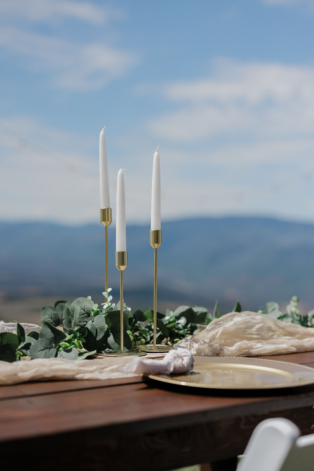 table at a glenwood springs airbnb venue is set up with decor at micro wedding reception