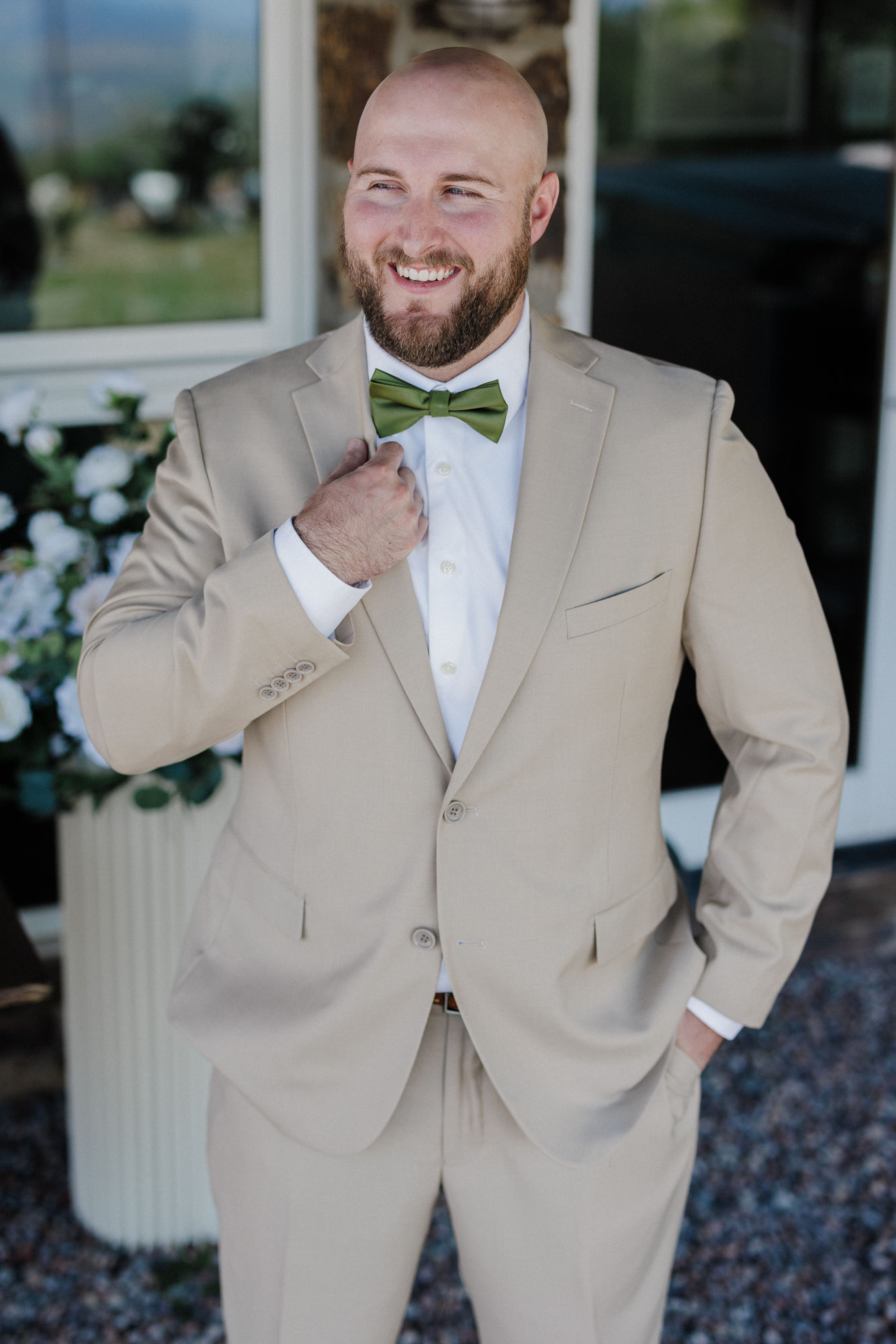 groom poses for colorado micro wedding photographer