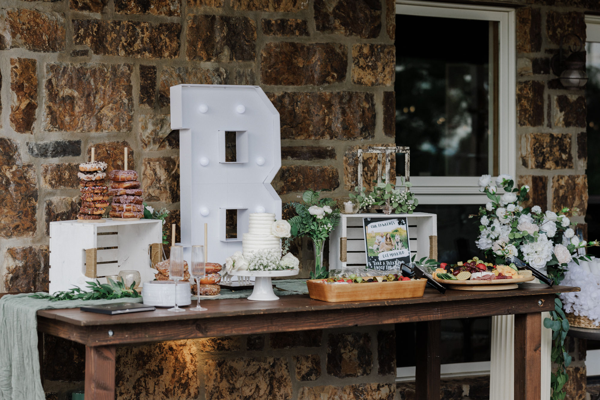 wedding cake and dessert table set up for a micro wedding ceremony at colorado airbnb