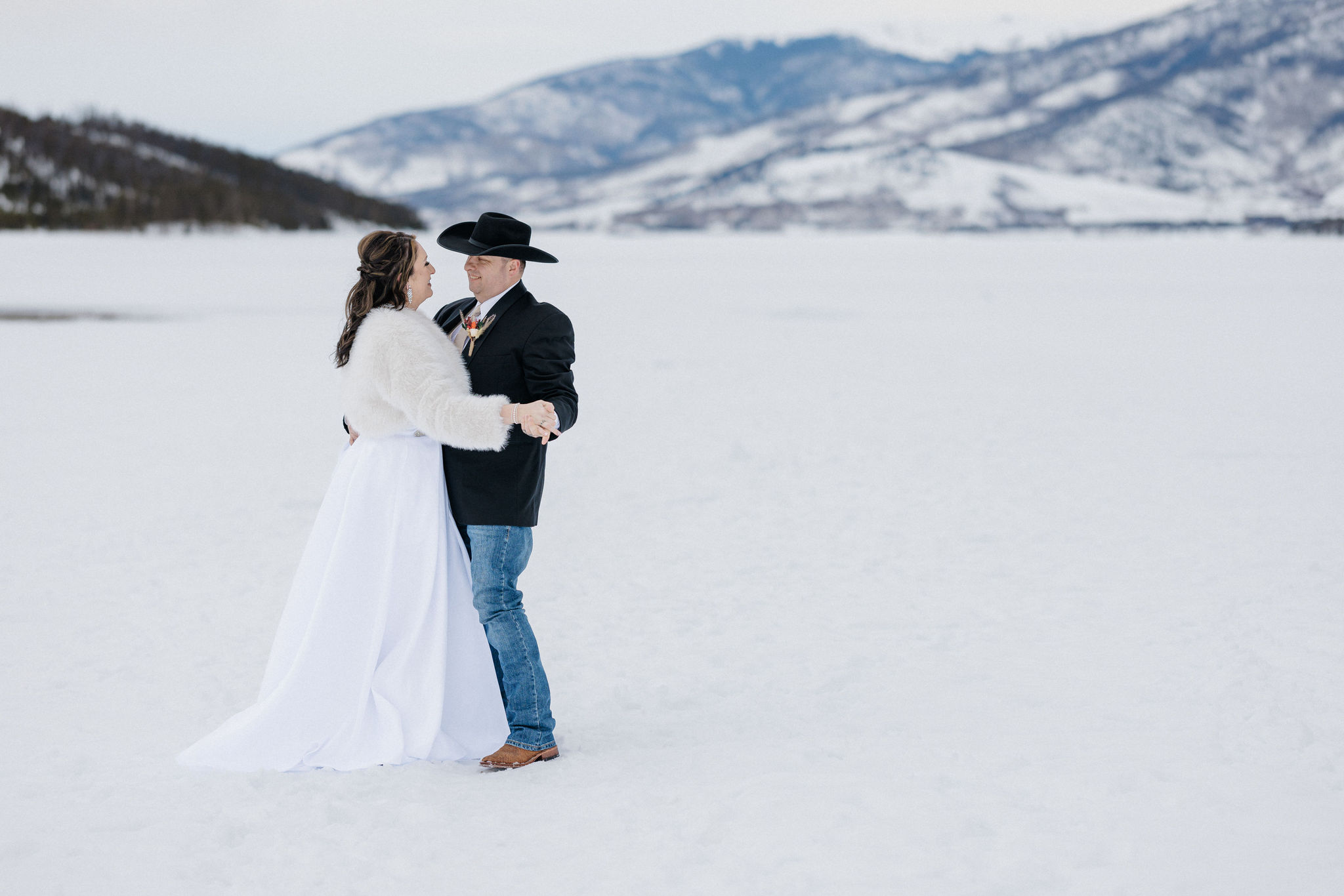 bride and groom dance during elopement in breckenridge colorado