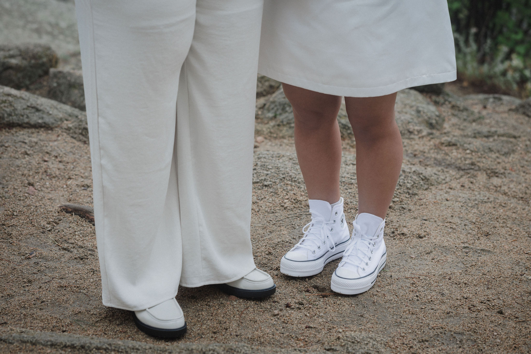 close up photo of two brides elopement shoes in the mountains