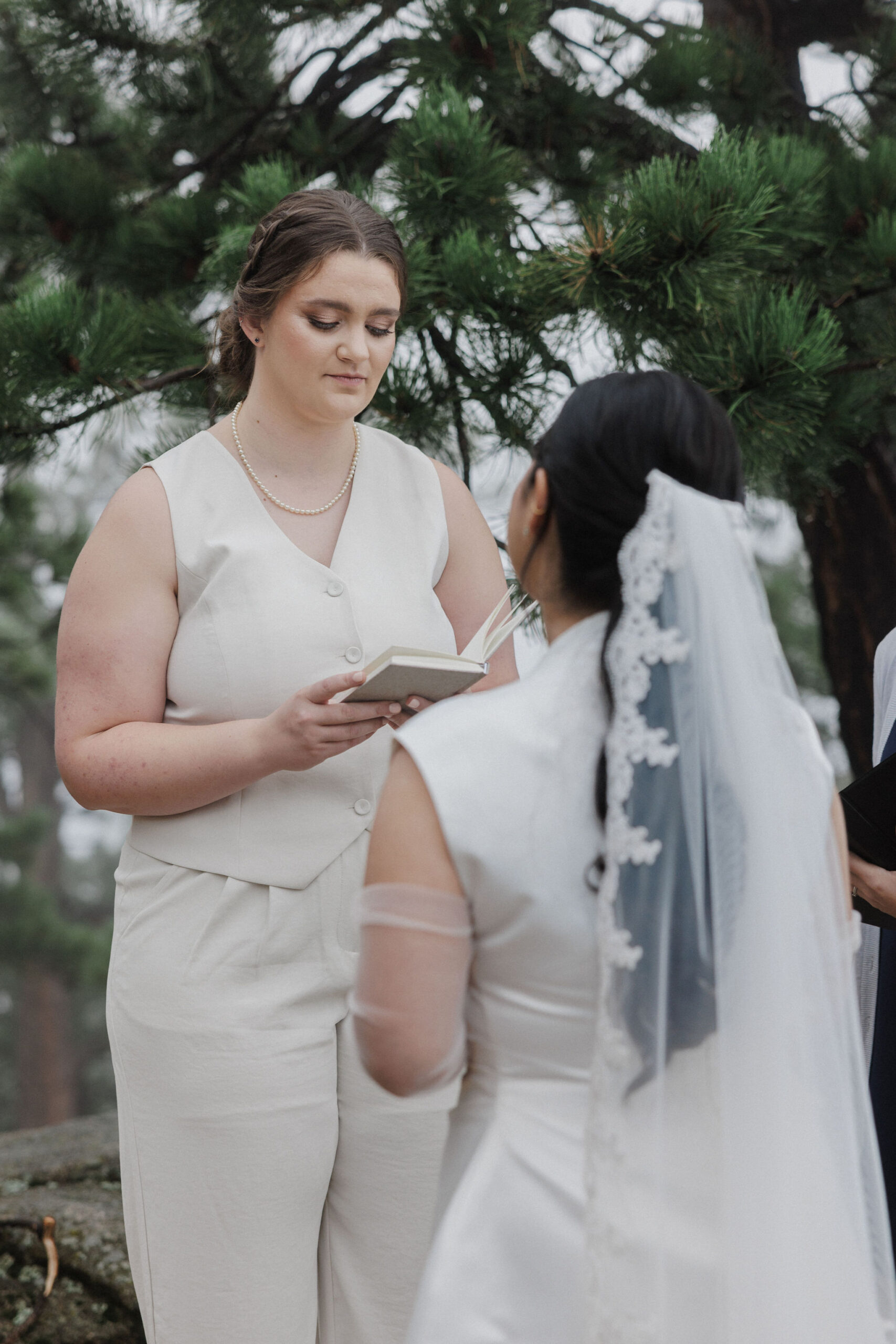 bride reads wedding vows during elopement ceremony