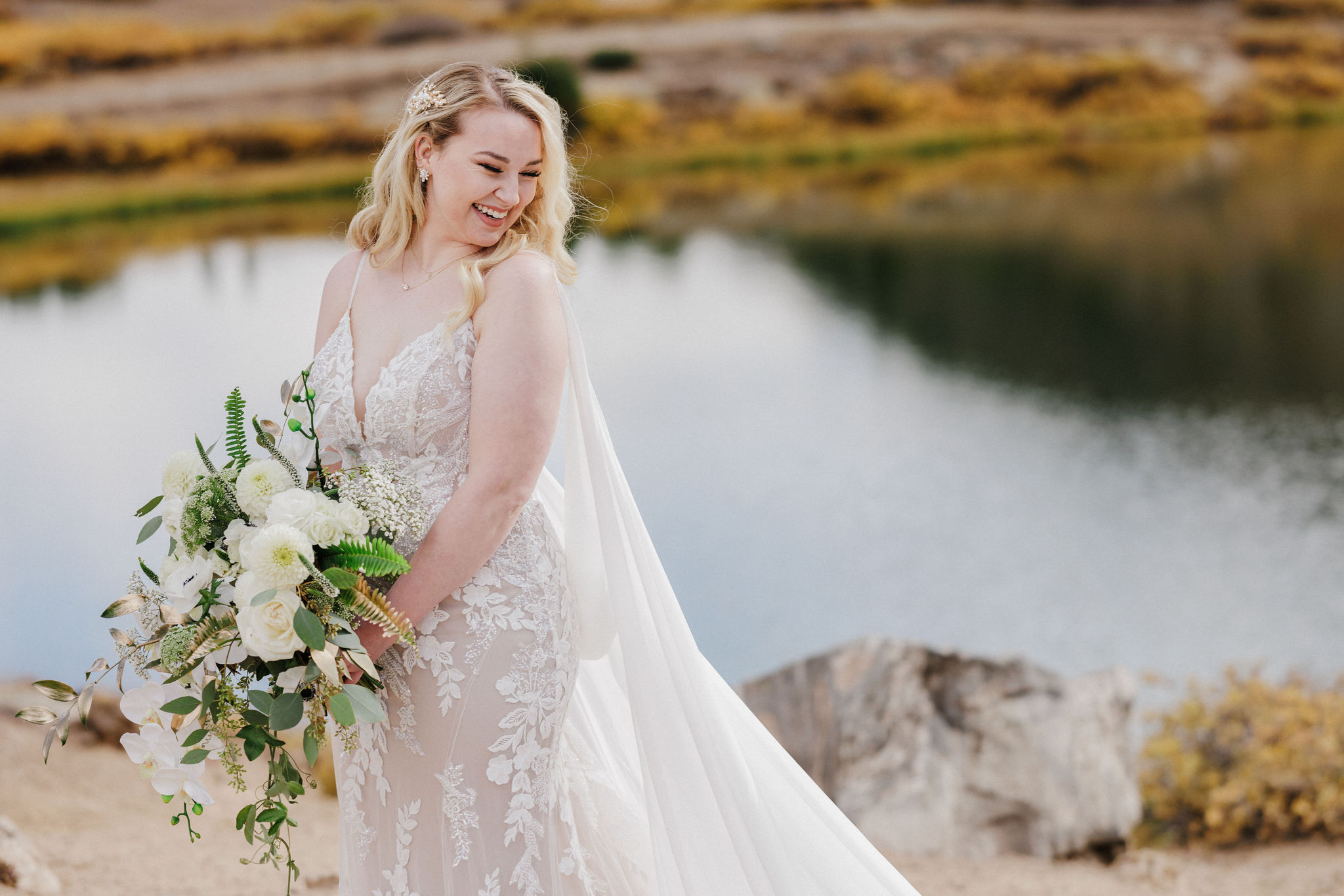 bride poses for colorado wedding photographer