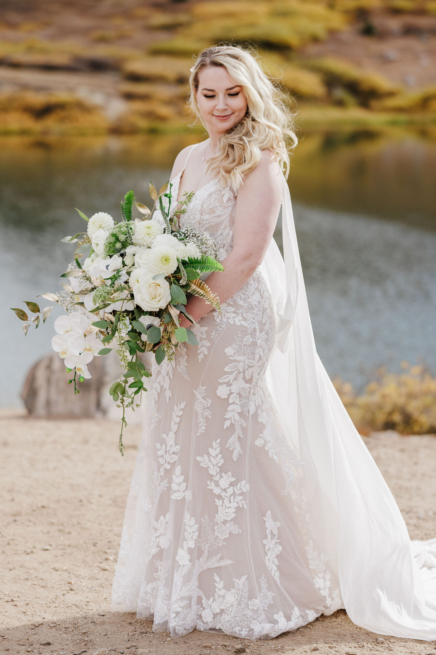 bride poses for colorado wedding photographer