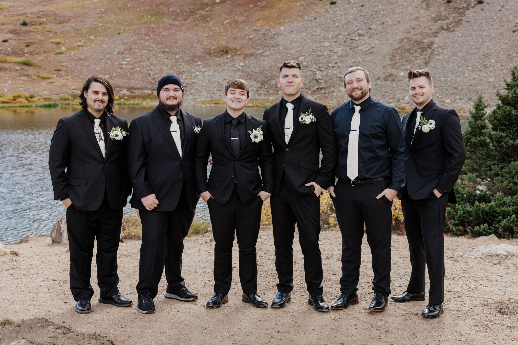 groomsmen pose for colorado wedding photographer