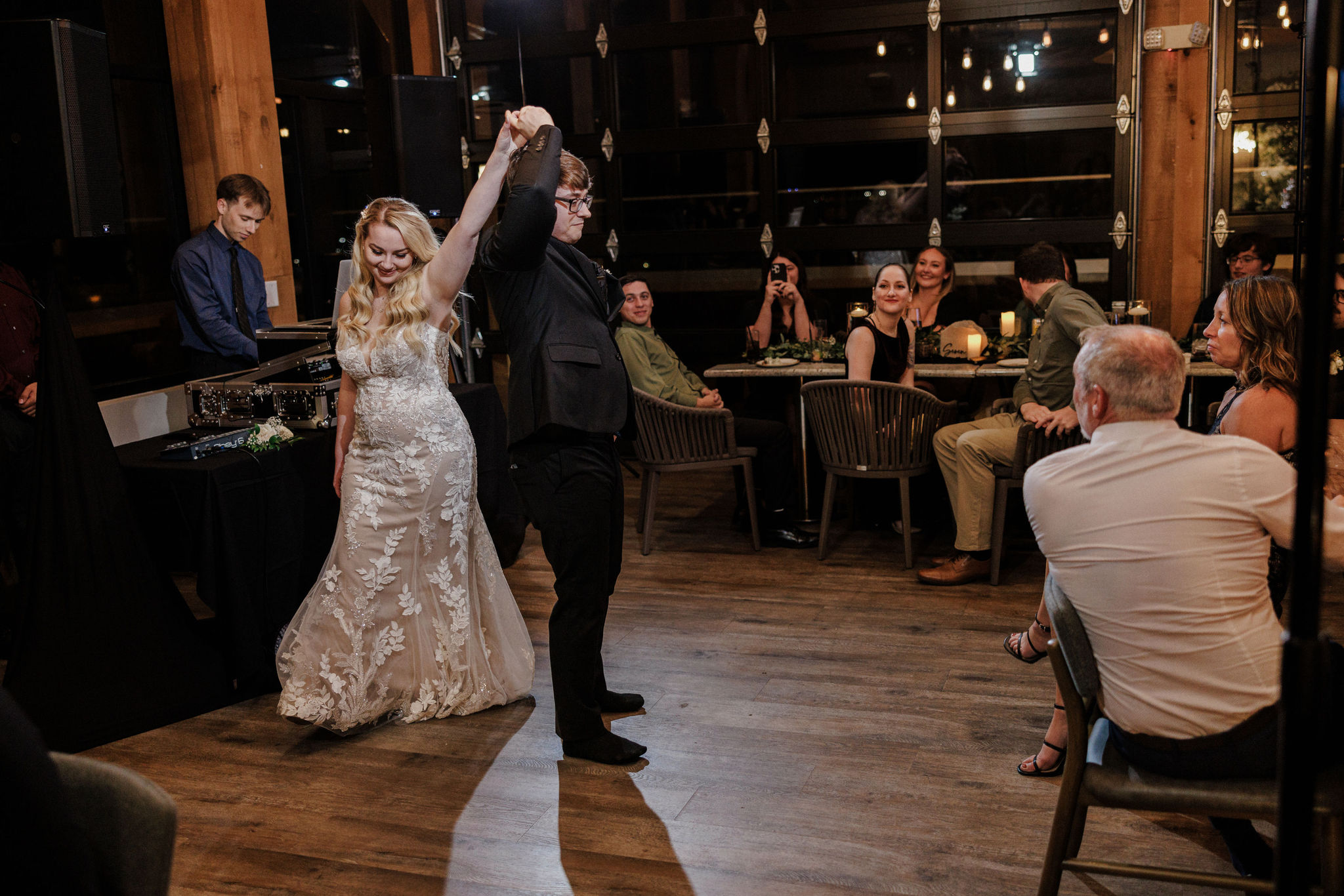 bride and groom dance during micro wedding reception