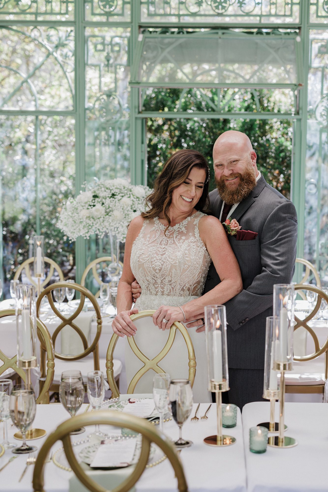 Bride and groom enjoy reception reveal at Denver Botanic Gardens.