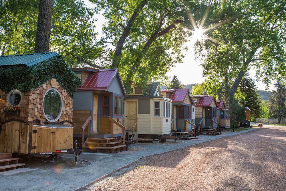 a row of tiny homes that can be used as micro wedding lodging in colorado