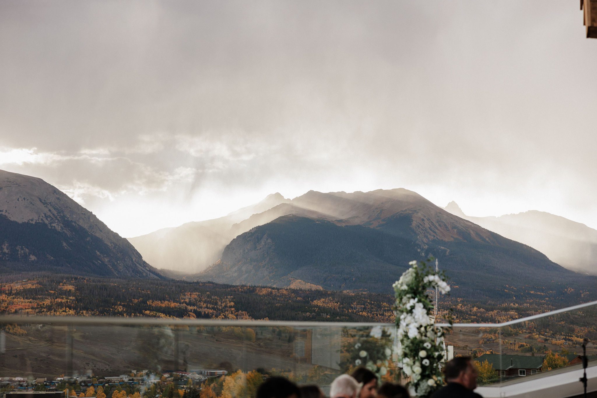 the view from the breckenridge micro wedding venue overlooking the mountains, fog rolling in