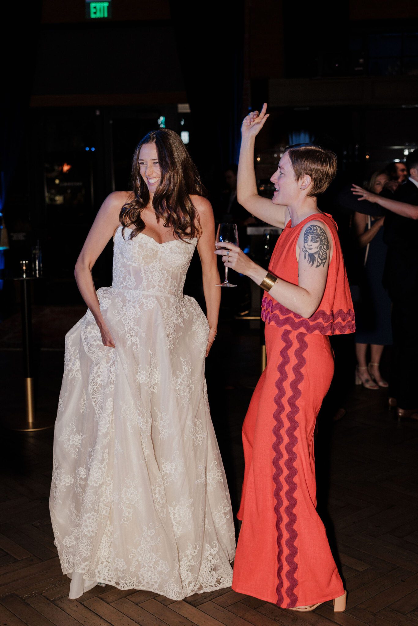 bride and bridesmaid dances during wedding reception at the ramble hotel