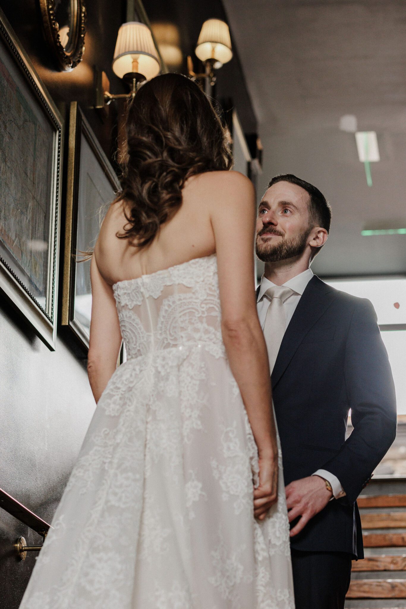 groom sees his bride for the first time before micro wedding ceremony at the ramble hotel