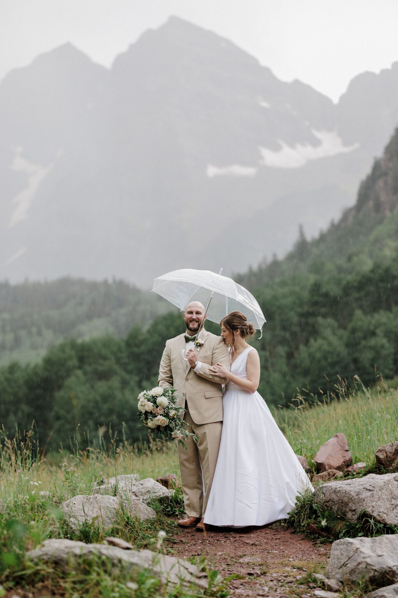 bride and groom get married at colorado fall wedding venue- maroon bells