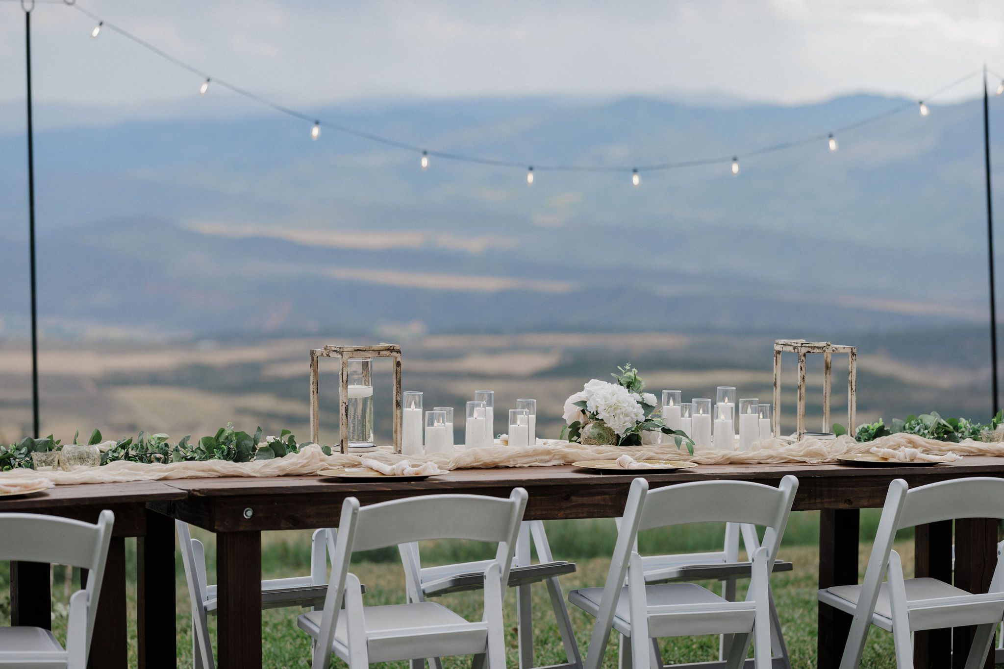 dinner table set up in yard of airbnb during elopement 