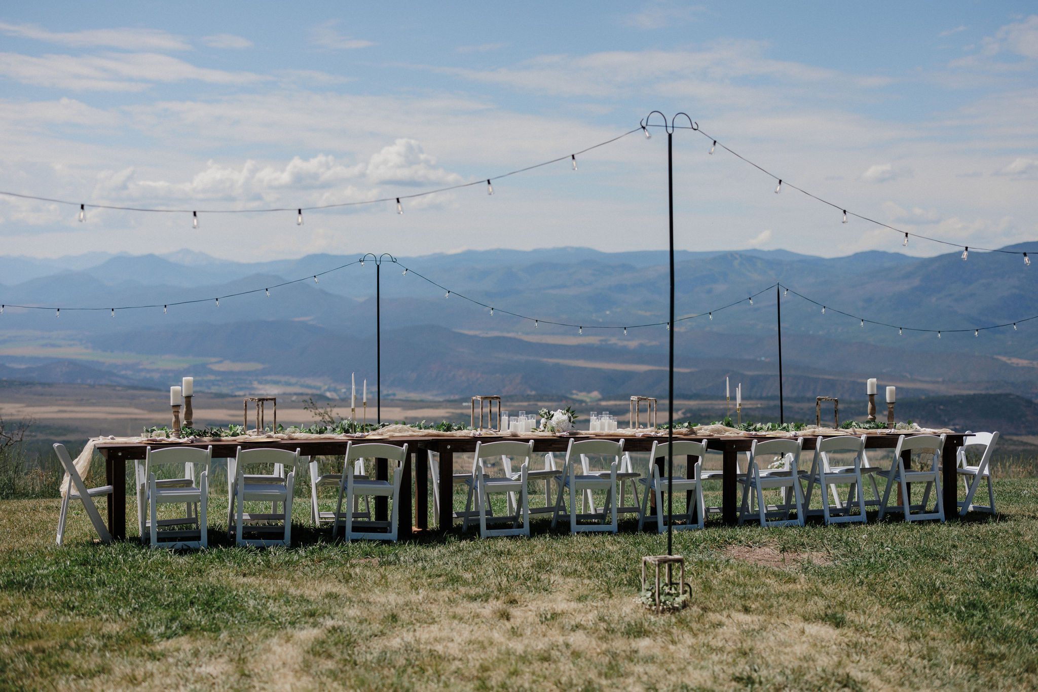 long family style table set up for a backyard wedding at an airbnb