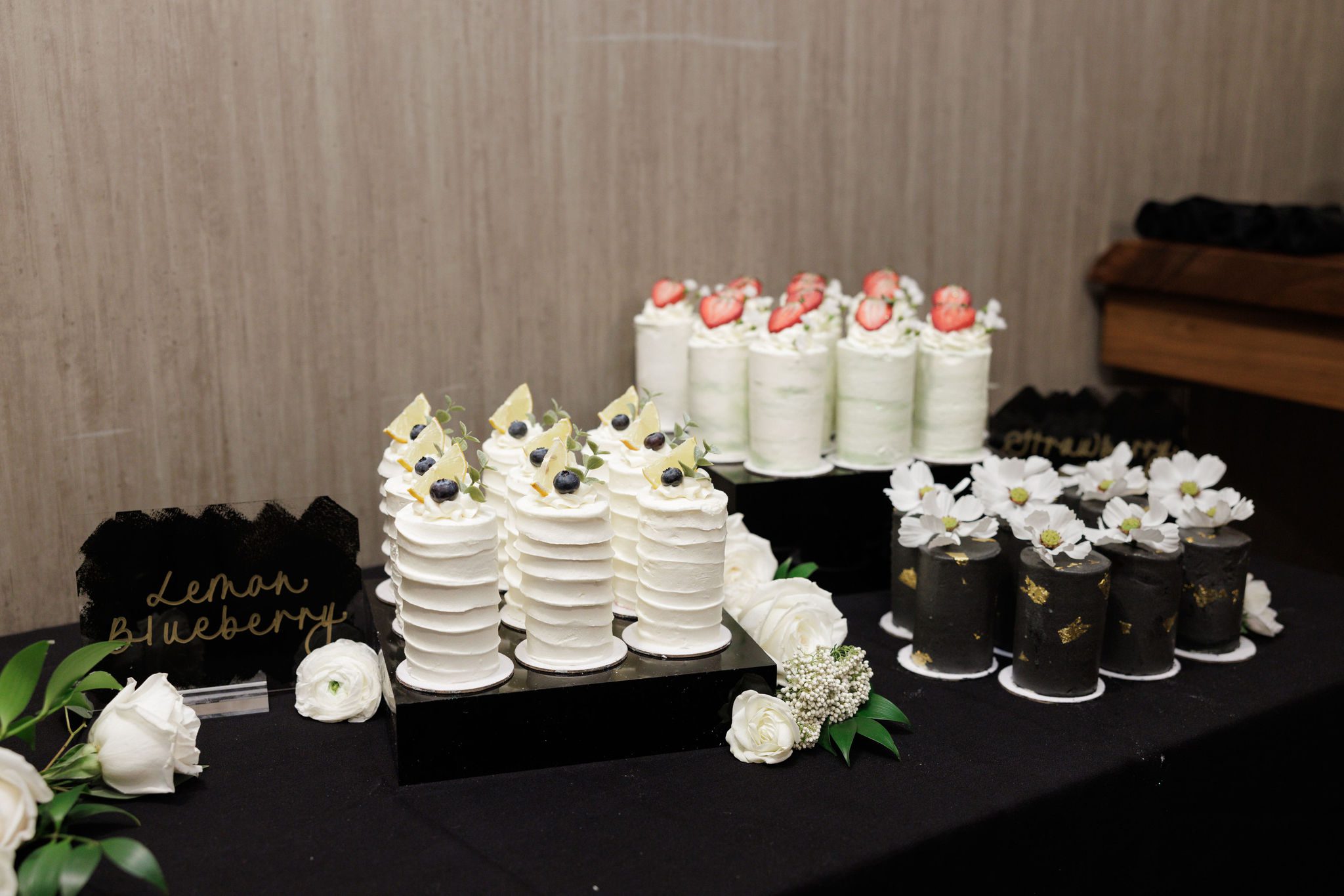 desserts, made by elopement vendor, a baker, sit on table for wedding reception
