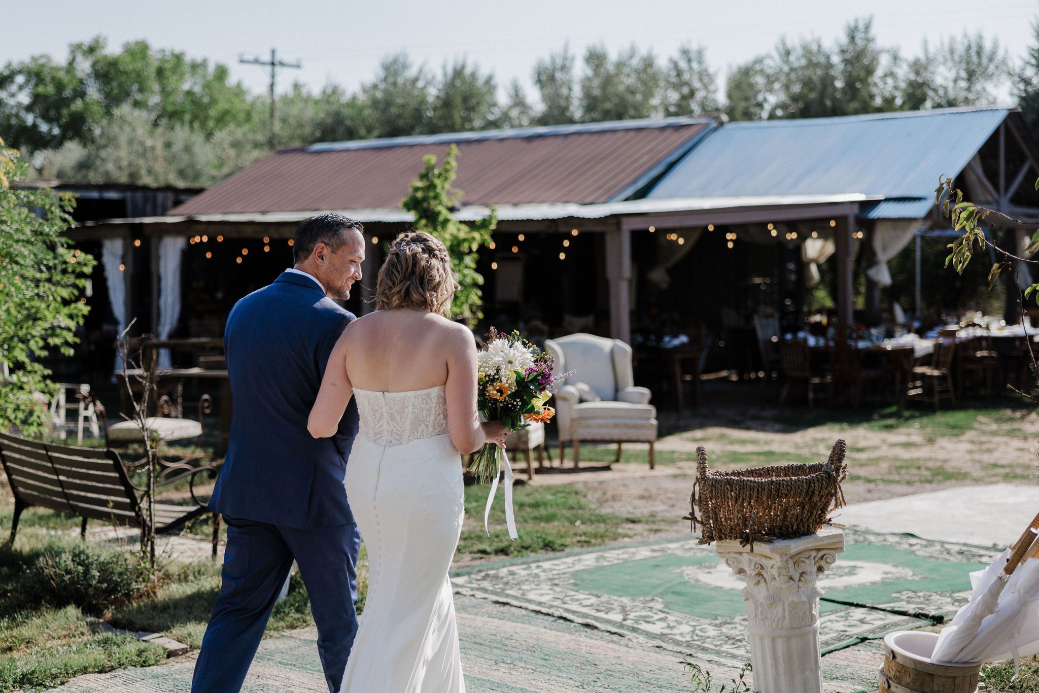 bride and groom walk back down aisle at wedding venue during best time of year to get married
