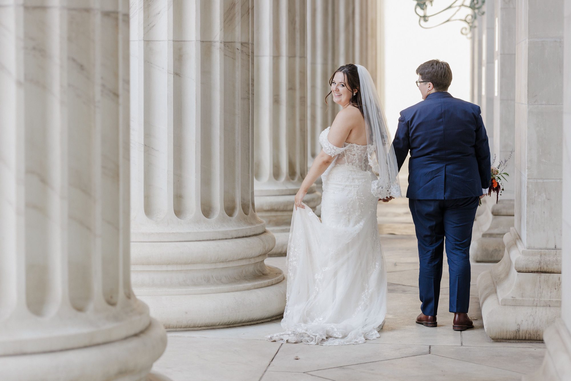 after colorado proposal, couple takes engagemenent photos in downtown denver