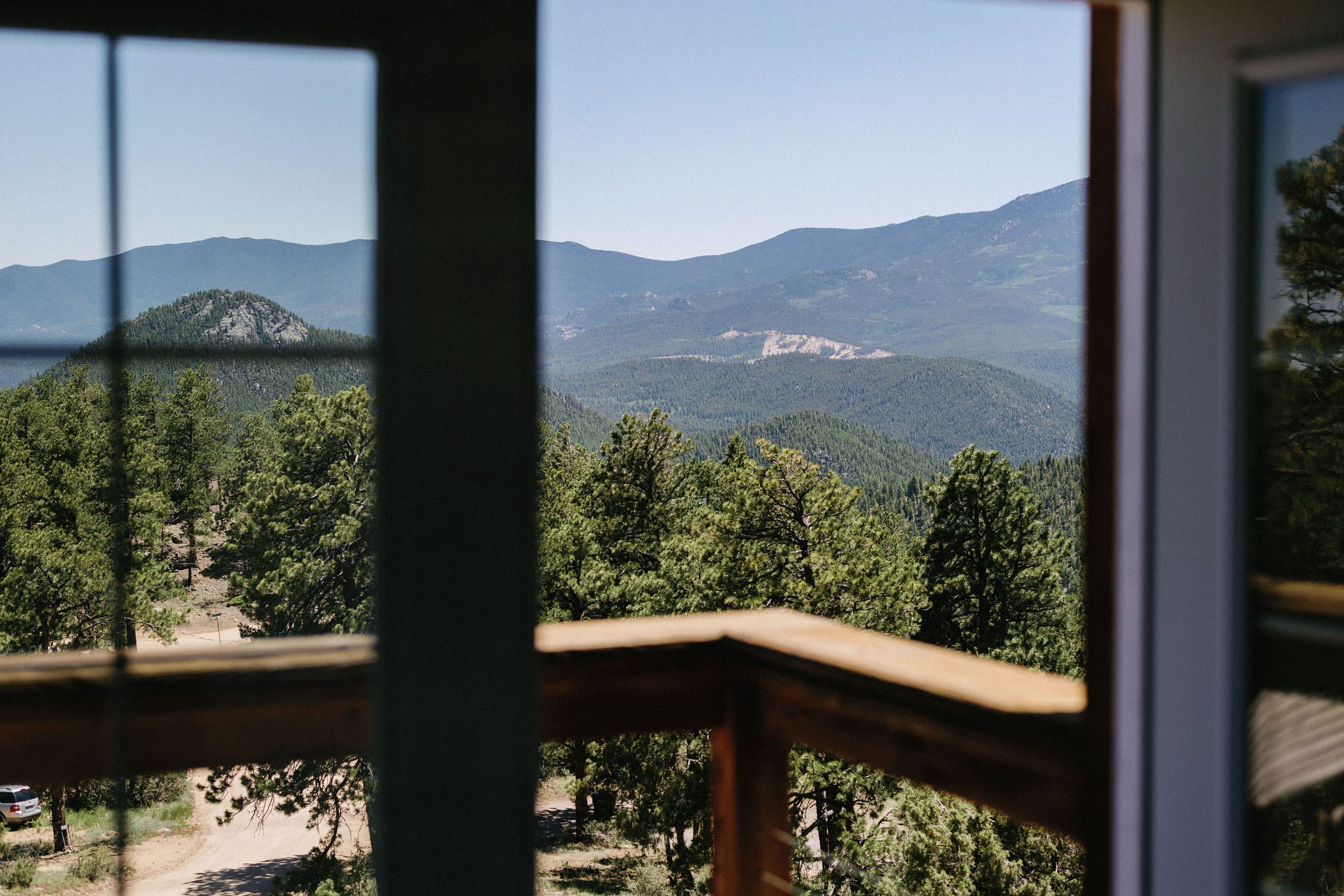 view looking at the mountains out the window of the airbnb